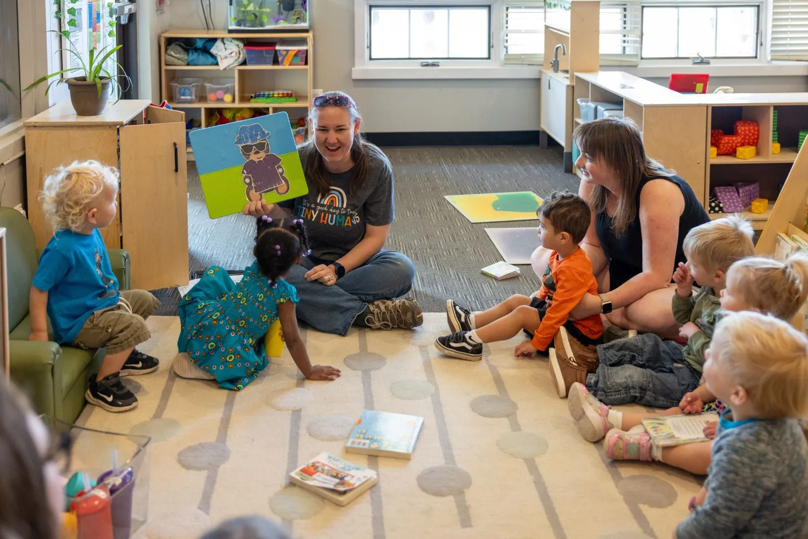 Teacher reading to a toddler group at the FDC