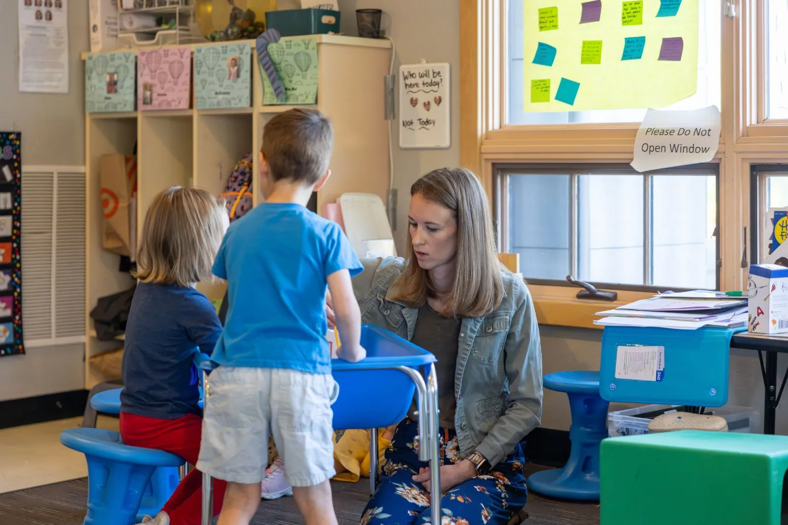 Teacher playing with toddler group at the FDC