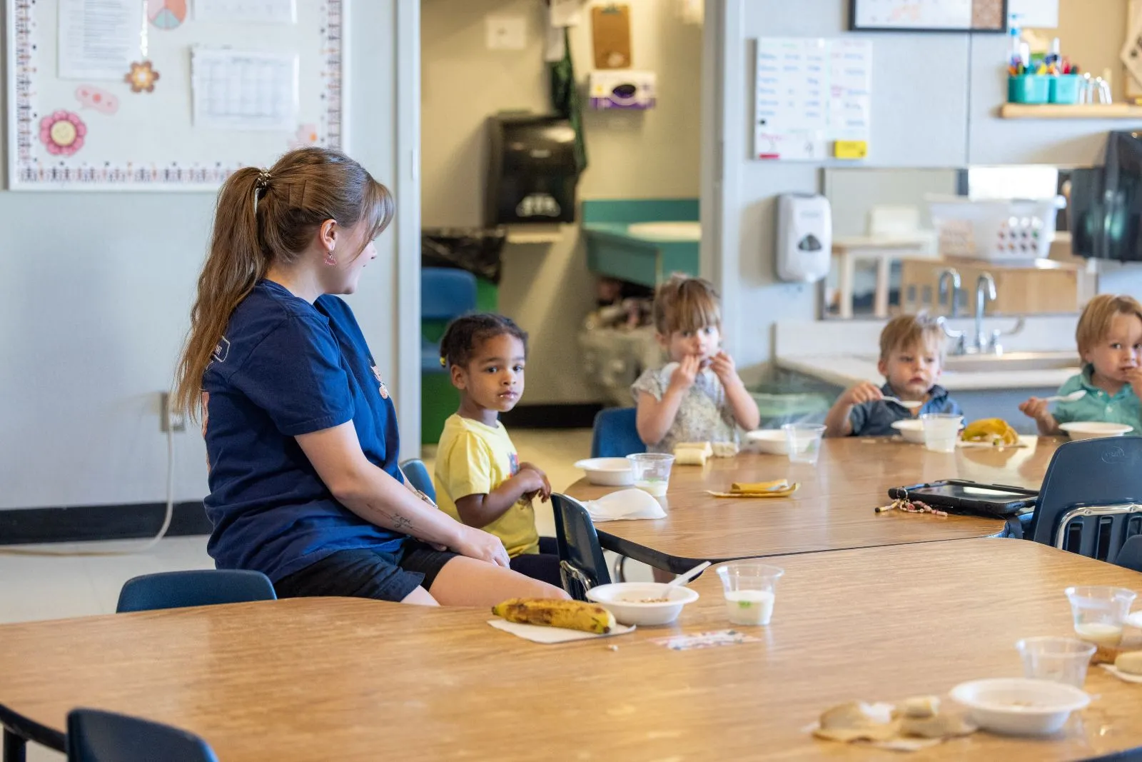 Group of children eating a meal