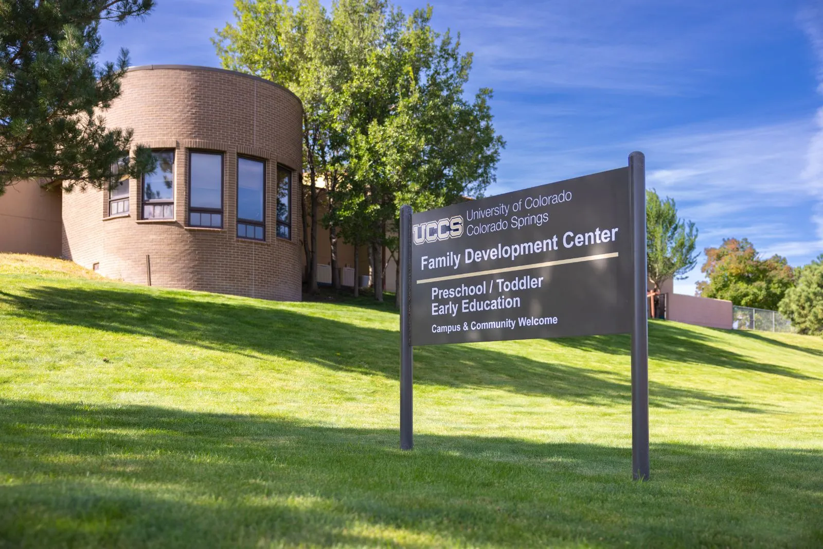 Exterior of the FDC building with sign that reads "UCCS Family Development Center - Preschool / Toddler Early Education"