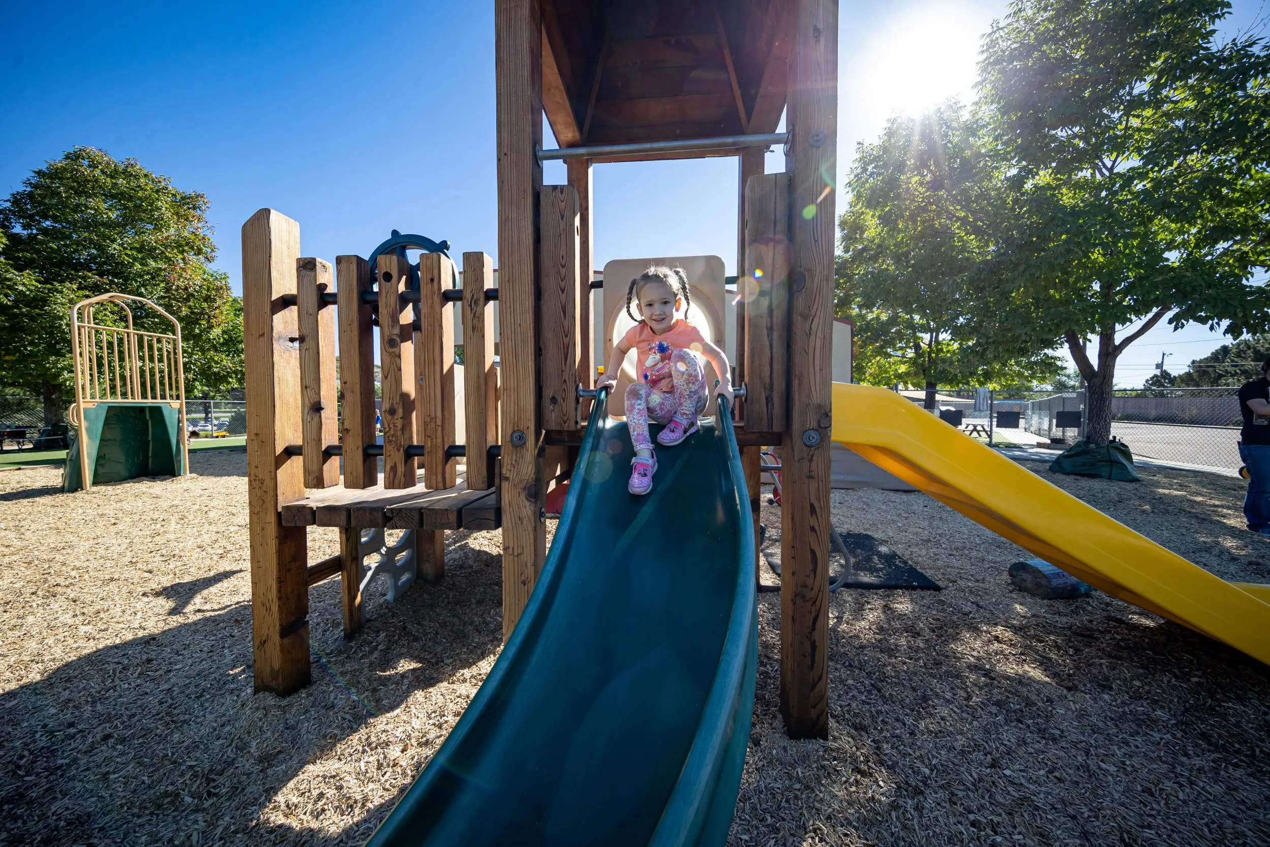 Child Going Down the Slide