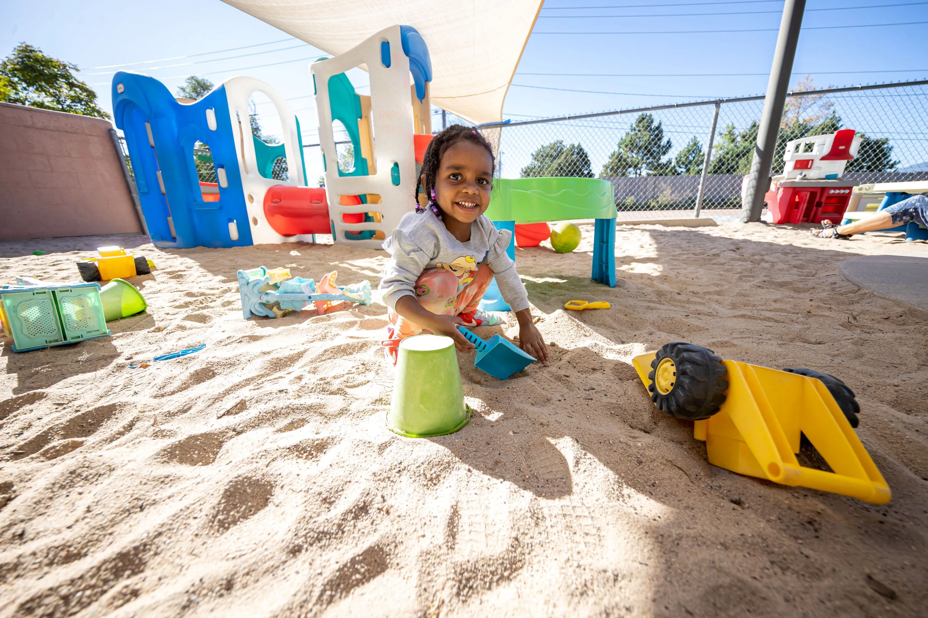 Child playing in a sand pit
